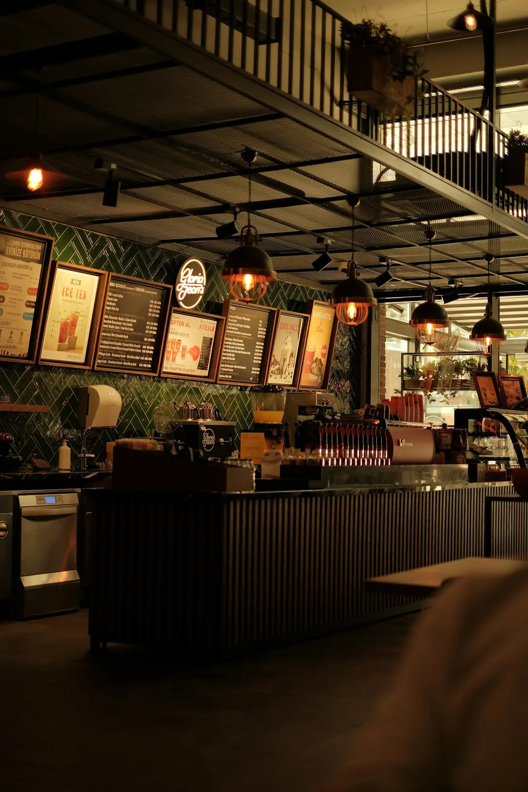 Chalkboard menu and espresso machine at Cafe Davao